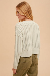 ROUNDNECK POINTELLE KNIT SWEATER