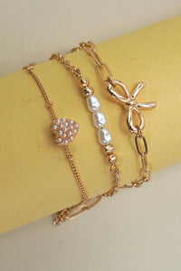 CHARM BRACELET-MULTI LAYER BOW PERAL HEART CHARMS
