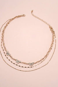 MULTI LAYER RHINESTONE BOW STATION NECKLACE