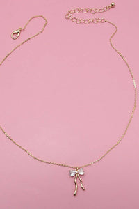 PETITE RHINESTONE BOW NECKLACE