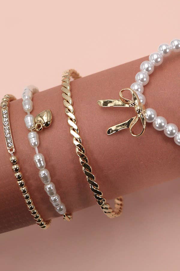 BOW PEARL RHINESTONE BAR STRETCH BANGLE SET