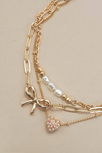 CHARM BRACELET-MULTI LAYER BOW PERAL HEART CHARMS