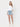 HIGH RISE DISTRESSED HEM DENIM SHORTS