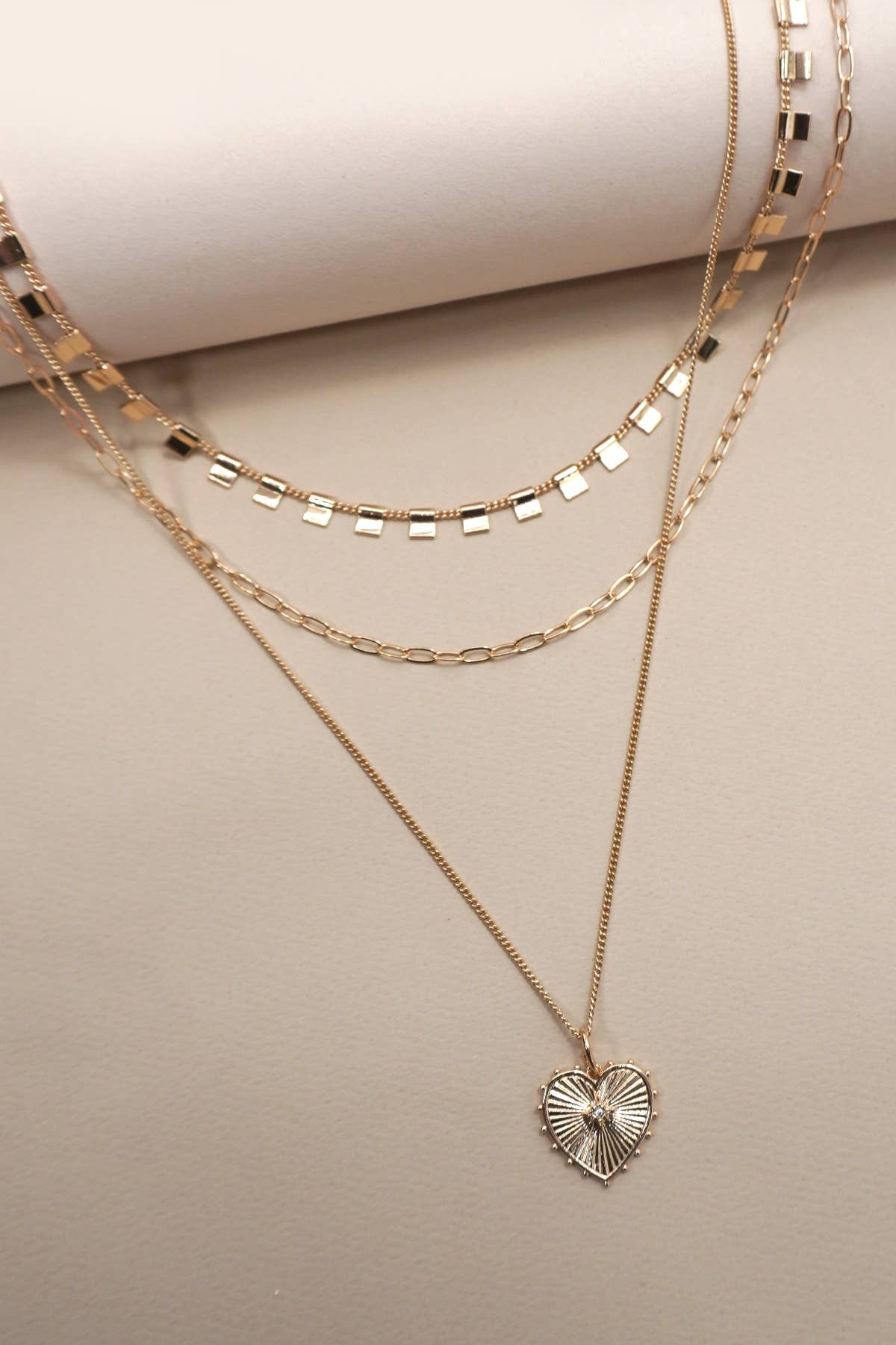 MULTI LAYERED ETCHED HEART CHARM NECKLACE